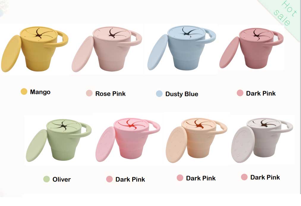 toddler holding silicone snack cup with lid